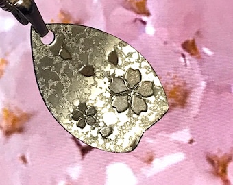 One spring, stainless steel, Japan, cherry blossom petal pendant.