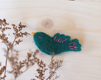 bird brooch in felted wool with embroidery