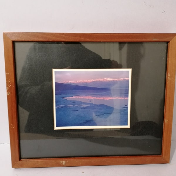 Framed and glazed art photo print in wooden frame sunset on a snowy mountainside