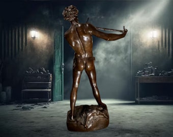 L'Improvisateur".  Bronze à patine médaille.  Signé Félix Charpentier