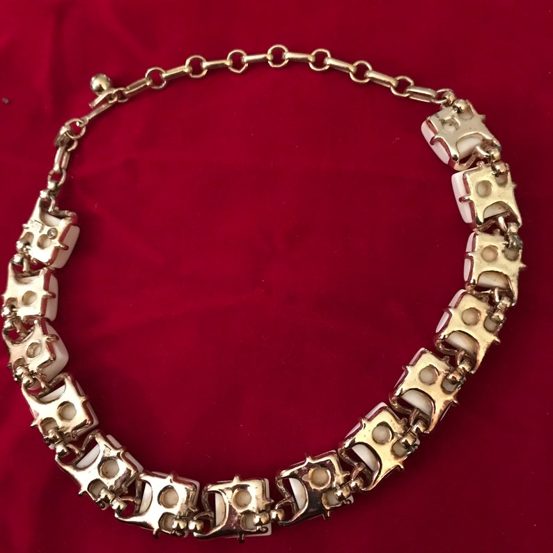 Vintage signed Coro choker with white thermoplastic squares set in goldtone metal.