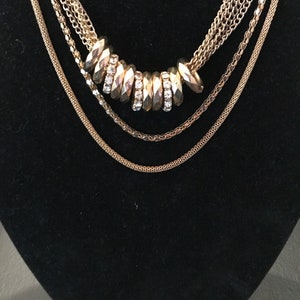 Vintage signed Coro choker with white thermoplastic squares set in goldtone metal.