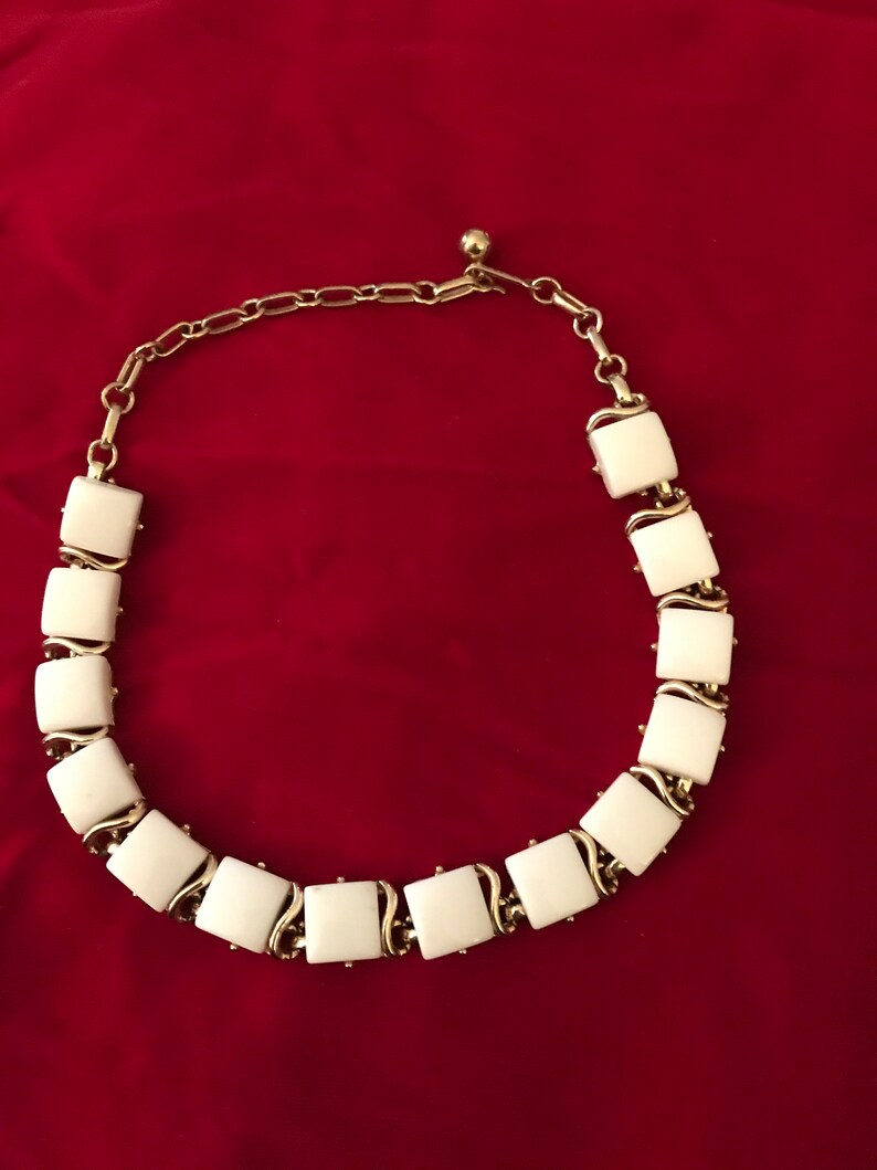 Vintage signed Coro choker with white thermoplastic squares set in goldtone metal.