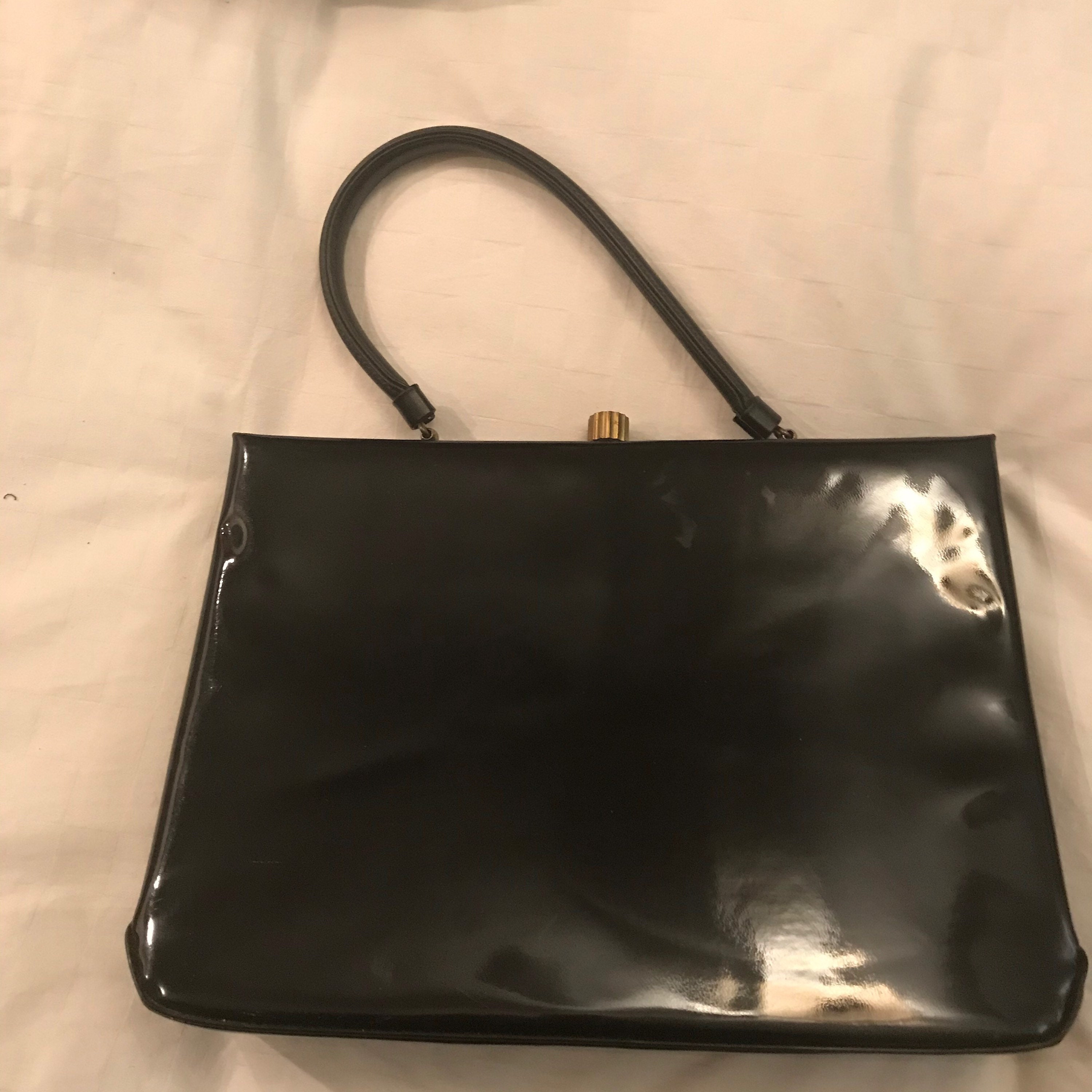 black and white patent leather purse