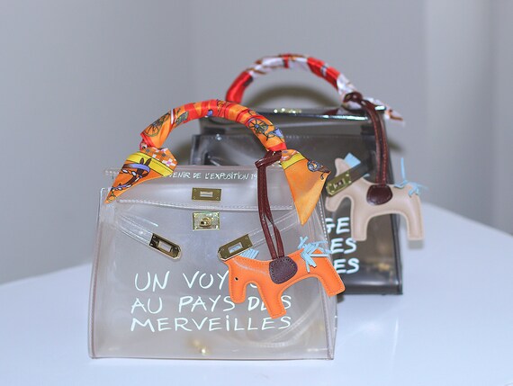 un voyage clear bolsa