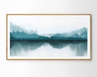 May include: Abstract watercolor painting of a teal landscape with a reflection in water. The painting is framed in a natural wood frame.