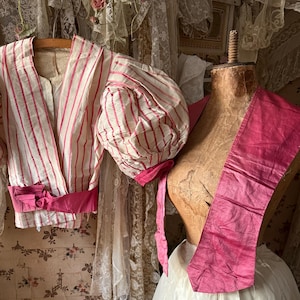 Exquisite 1850 silk and Lace two piece ensemble , comprising of a two-piece Victorian pink candy striped jacket raw silk champagne skirt