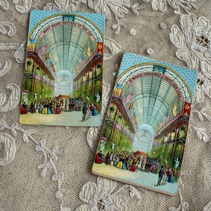 Dos tarjetas poco comunes de la Reina Victoria inaugurando la Gran Exposición de 1862 en Crystal Palace