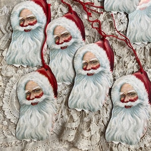 25 etiquetas de regalo navideñas de estilo antiguo con diseño de Papá Noel y San Nicolás de la época victoriana.