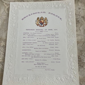 1891 Buckingham Palace Royal Concert programme with embossed Royal Arms and exquisite lace paper