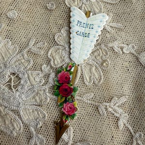 Rebut de fabrication de cartes en relief antiques, message caché