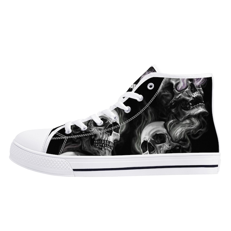 May include: Black and white high-top canvas shoes with a skull and smoke design.