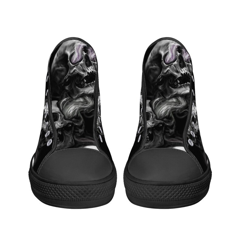 May include: Black high-top canvas shoes with a skull and smoke design. The skull is white with a purple glow in the eye sockets.