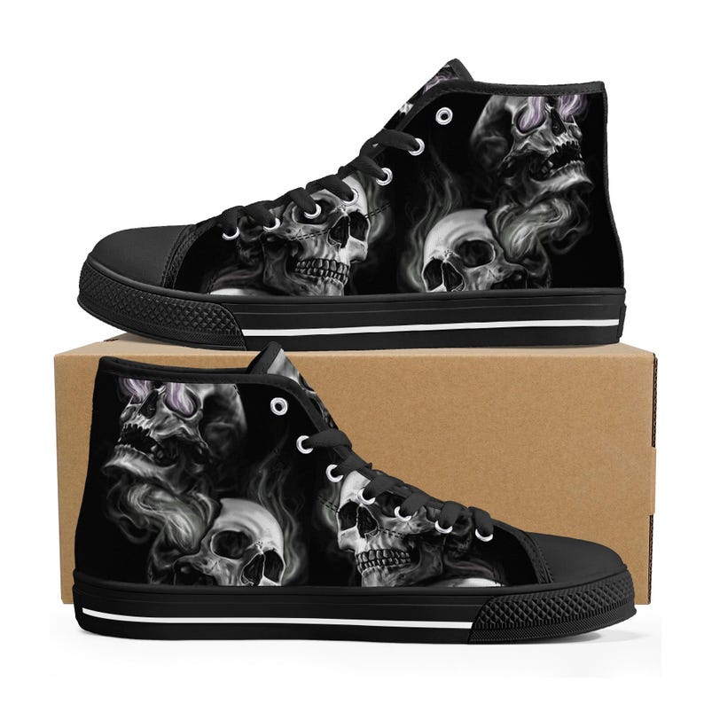May include: Black high-top canvas shoes with a skull and smoke design. The shoes have white laces and a white stripe around the sole.