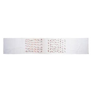May include: A long, white fabric table runner. The runner has two patterned sections with small, colourful diamond shapes in shades of pink, purple, and grey. The design is symmetrical, with the patterned sections on either end.