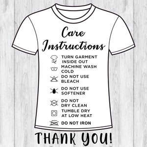 May include: A white t-shirt with black care instructions printed on it. The instructions include: Turn garment inside out, Machine wash cold, Do not use bleach, Do not use softener, Do not dry clean, Tumble dry at low heat, Do not iron. The text "Thank you!" is printed at the bottom of the shirt.