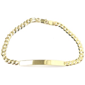 May include: A gold curb chain bracelet with a rectangular nameplate. The bracelet is made of yellow gold and features a secure clasp. The design is simple and elegant, suitable for everyday wear.