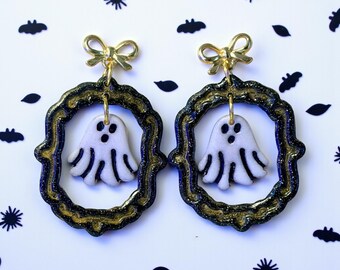 Brincos pendurados fantasma emoldurados