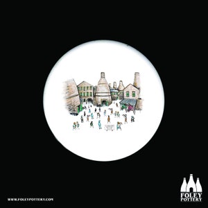 May include: A white ceramic coaster featuring a black and white illustration of a pottery factory. The illustration depicts a group of people walking around the factory, which has several tall chimneys. The text "Victorian Pottery" is written on a sign in the centre of the image.