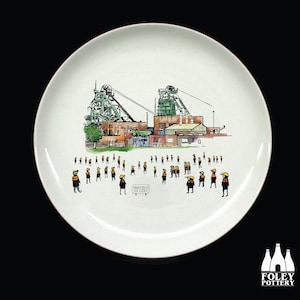 May include: A white ceramic plate with a black and white illustration of a coal mine and a group of miners. The text "Mansfield Colliery" is printed on a sign in the image.