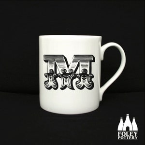ALPH: M - Alfabeto - Letra - Inspirado - Ilustrado - Homenaje - Taza de porcelana fina