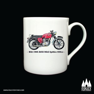 May include: White ceramic mug with a red, white, and blue illustration of a BSA A65S MkII Spitfire 650cc motorcycle. The text "BSA 1966 A65S MkII Spitfire 650cc" is printed below the motorcycle.