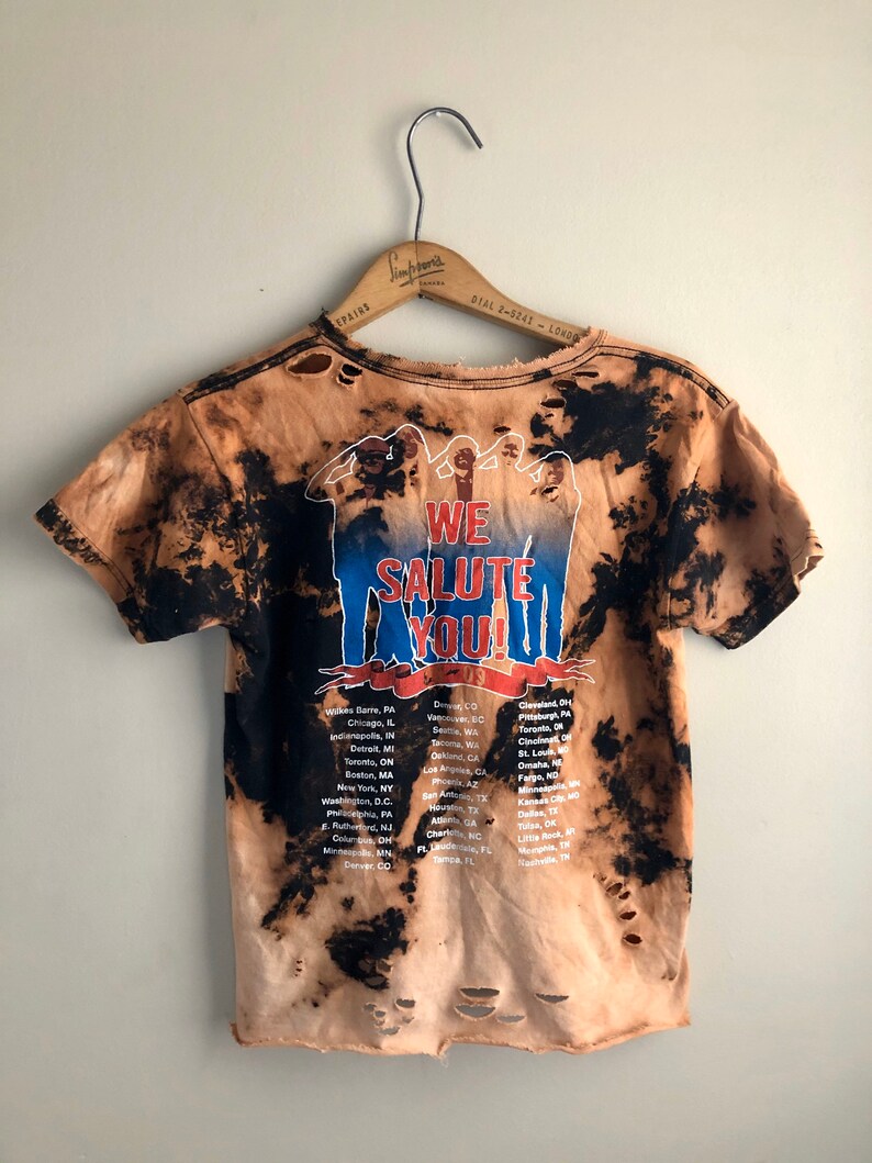 Bleached and tattered ACDC tour shirt size L but sized like a S