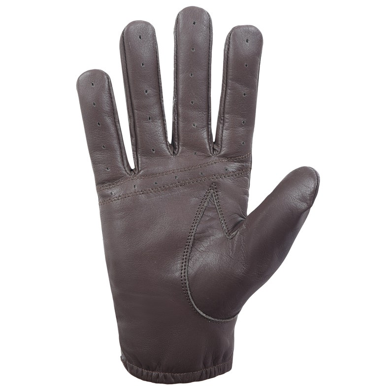 May include: A brown leather driving glove with a perforated design on the back of the hand.