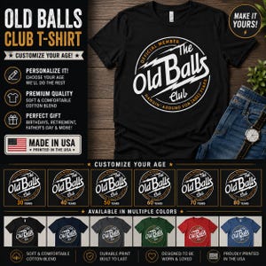 以下が含まれることがあります： 白い円形デザインに「The Old Balls Club」の文字が入った黒いTシャツ。年齢でカスタマイズ可能で、複数の色があります。アメリカ製です。