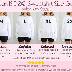 May include: A white Gildan 18000 sweatshirt size guide with four models wearing different sizes: M, L, XL, and 2XL. The guide provides fitting recommendations: fitted, regular, relaxed, and oversized. The model is 5 ft 8 in tall and wears a size large.