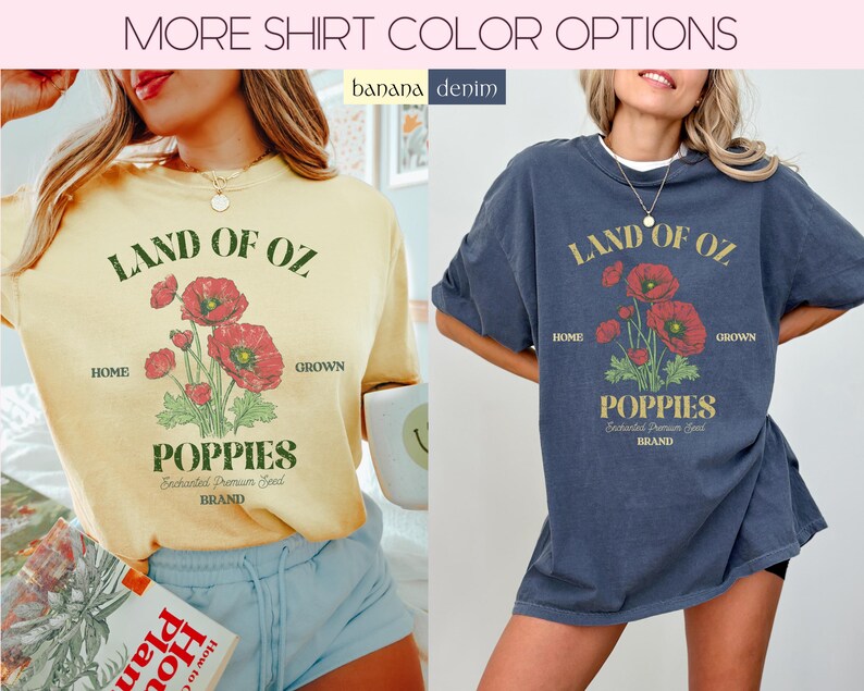 May include: Two t-shirts, one yellow and one navy blue, each with a graphic of red poppies and the text "LAND OF OZ POPPIES." The shirts have a vintage aesthetic, with the text and graphic in a distressed style. The shirts are part of a clothing collection.