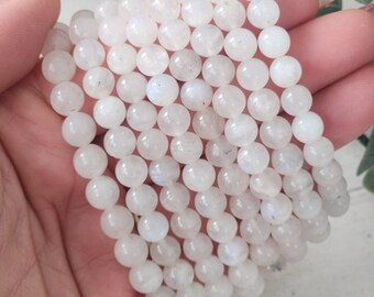 White moonstone crystal with blue flash Stretch bead Bracelet: 7-8mm Bead sizes