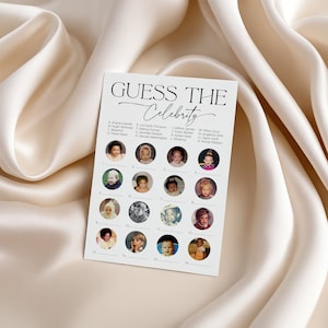 5 x 7 guess the celebrity game card laying on soft, satin fabric
