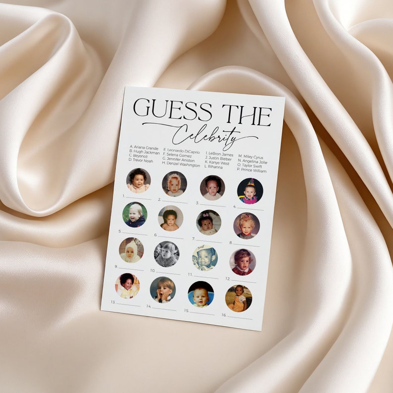 5 x 7 guess the celebrity game card laying on soft, satin fabric