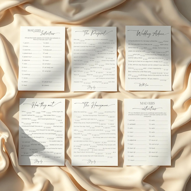 Bridal Mad libs games and instructions laying on soft, neutral fabric