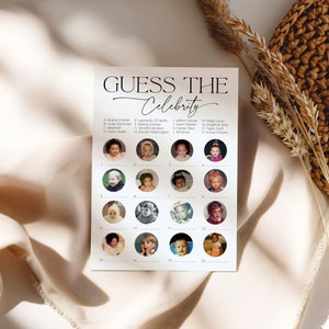 Who Is That Celebrity game card laying on soft fabric with dry flowers in the background