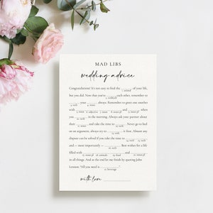 May include: A printable Mad Libs game card with the title "wedding advice". The card features a fill-in-the-blank game with a wedding theme.