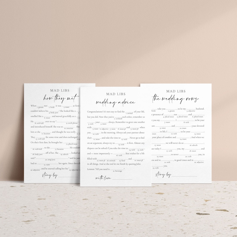 Peut inclure: Trois cartes de jeu Mad Libs imprimables avec un fond blanc et du texte noir. Les cartes sont intitul&eacute;es "Comment ils se sont rencontr&eacute;s", "Conseils de mariage" et "Les v&oelig;ux de mariage".