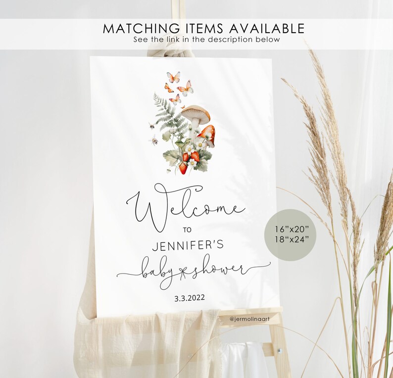 May include: Welcome to Jennifer's baby shower sign with a mushroom, fern, and butterfly illustration. The sign is white with black text and is available in 16"x20" or 18"x24" sizes.