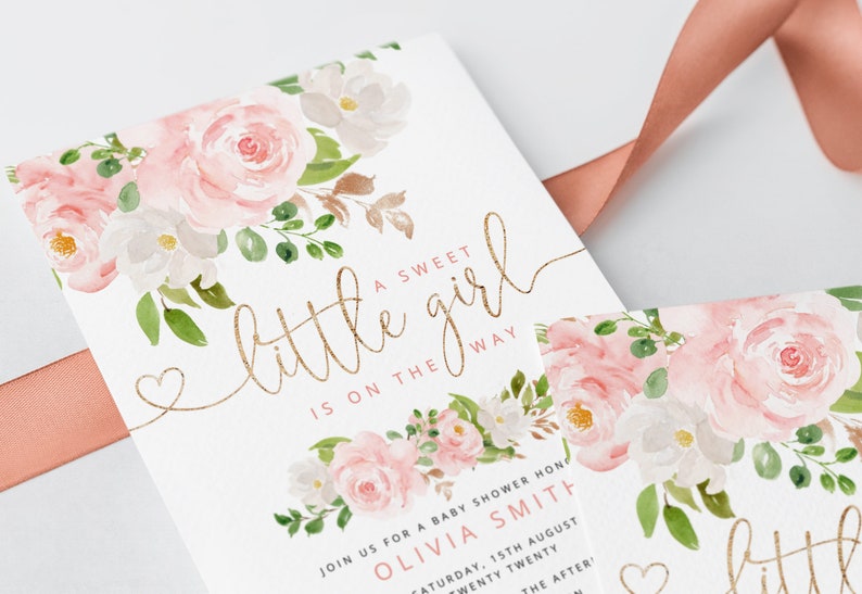 May include: A white card with pink and white watercolor flowers and gold lettering. The text reads "A sweet little girl is on the way."  Join us for a baby shower honoring Olivia Smith, Saturday, 15th August, Twenty Twenty, The After.