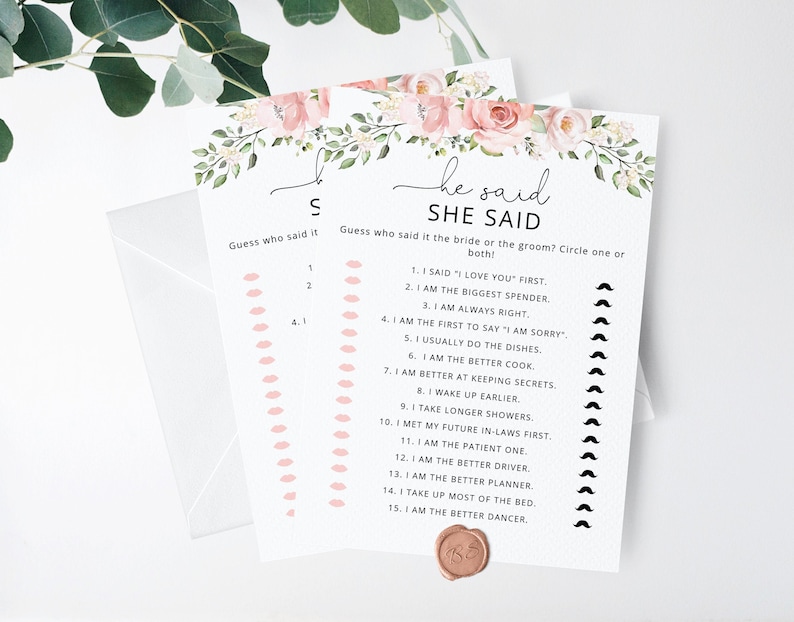 Op de afbeelding: Een printbaar "Zij zei" spel voor een bruidsdouche. Het spel heeft een bloemmotief met roze bloemen en groene bladeren. Het spel vraagt ​​gasten om te raden wie het zei, de bruid of de bruidegom, voor 15 verschillende uitspraken.