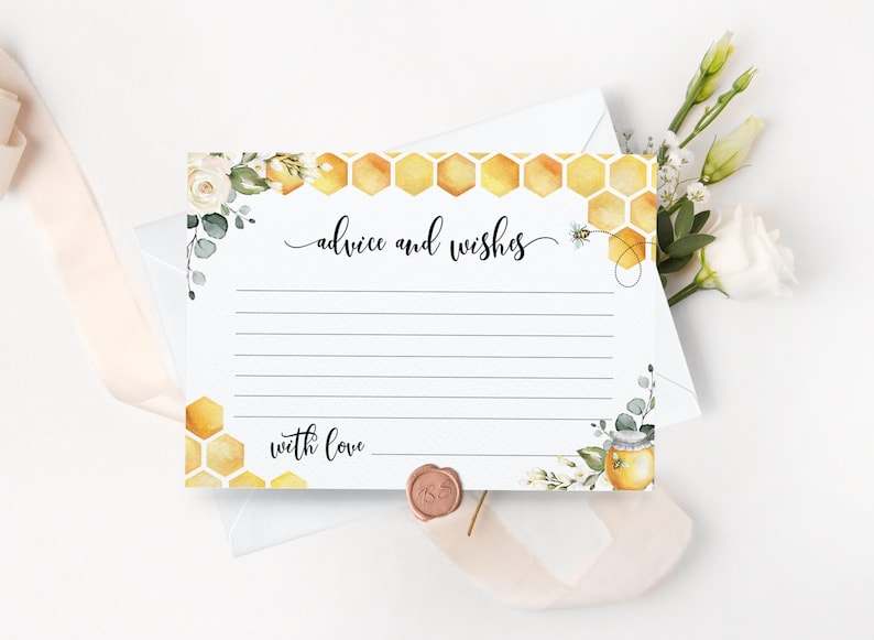 May include: A white card with a honeycomb pattern and floral accents. The card has the text "advice and wishes" and "with love" printed on it.