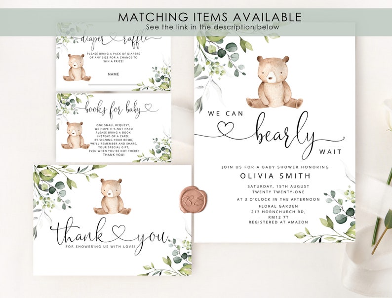 May include: A baby shower invitation with a woodland theme. The invitation features a cute cartoon bear with a heart and the text "We can barely wait". The invitation is decorated with green leaves and flowers.