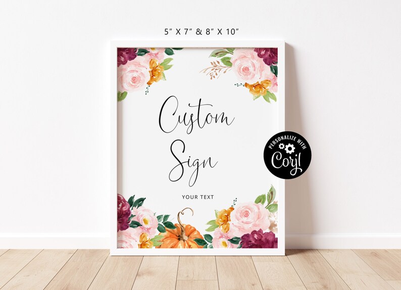 May include: A white framed sign with a floral design in shades of pink, burgundy, orange, and green. The sign says "Custom Sign" and "Your Text".