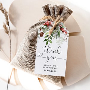 May include: A white thank you tag with a watercolor floral design in shades of green and red. The tag says "thank you" with a heart and "Jennifer's Baby Shower 05.05.2021".