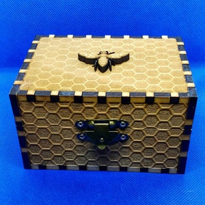 Handcrafted Maple Plywood Box with Honeycomb Design and Bee Accent. For the apiary enthusiast.