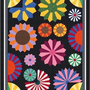 May include: A black background with a variety of colorful, geometric, starburst-shaped designs. The designs are made of fabric and are arranged in a random pattern.