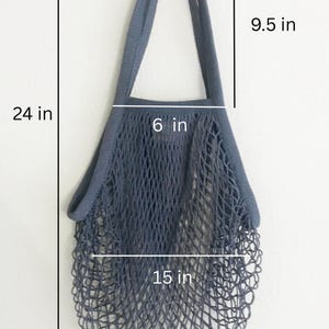Gray blue cotton net bag with ling shoulder straps, wide capacity mesh that expands for heavy duty grocery shopping produce.