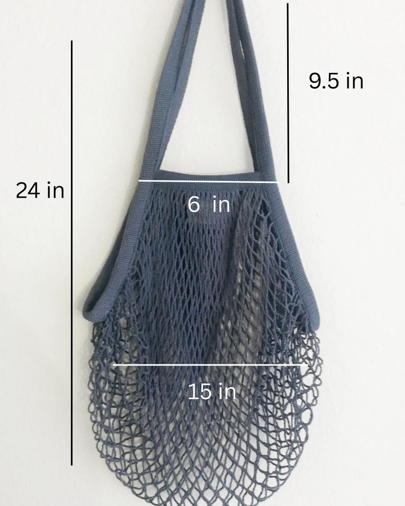 Gray blue cotton net bag with ling shoulder straps, wide capacity mesh that expands for heavy duty grocery shopping produce.