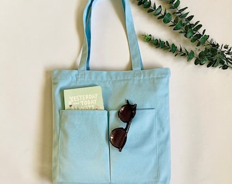 Durable Sky Blue Zippered Canvas Tote: Women Shoulder Bag with Inner and Outer Pockets